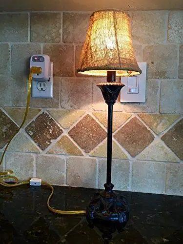 No Fuss Single Outlet Safety Timer With Push Button Countdown Automatic Shutoff Shields home electronics from overcharging with a lamp.