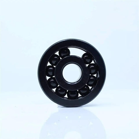 Top Shelf Two Piece High Temperature Deep Groove Ball Bearings 35X80X21Mm TB6307 Series viewed from the front, showcasing the black bearing structure.