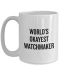 World's Okayest Watchmaker Coffee Mug for Horology Fans with bold text on white ceramic, dishwasher and microwave safe.