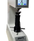 Solid Twin Rockwell Hardness Tester With Slick Touch Screen Controls And Built Tough Auto Conversion For Hra Hrb Hrc Scales Plus Brinell Vickers Outputs Heavy Duty Shop Floor Workhorse Gear in white finish with touchscreen display.