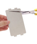Person cutting 6 Pack Microwave Mica Sheet Covers For Heat Insulation And Burn Protection, Easy Cut Waveguide Replacement Plates