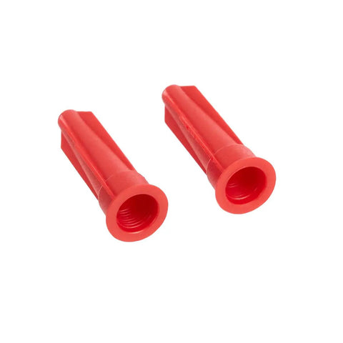 Two red nozzle caps from 12 Piece Pro Grade Caulking Tool Kit With Silicone Sealant Finishing Tools For Windows Doors Kitchens Sinks Bathrooms And Floors