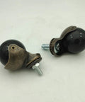 Solid Brass Ball Caster Wheels With Tight Locking Brake Four Pack Heavy Duty Polyurethane Rubber Treads black with brass fittings