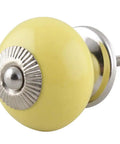 Slick Solid Yellow Ceramic Drawer Knobs Set Of Fifty Pro Level Kitchen Cabinet Hardware And Door Pulls For Dressers Home Decor Tool Free Hassle Free Long Lasting Finish close-up view of a yellow ceramic drawer pull with metal base.
