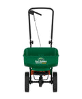 Front view of Turf Builder EdgeGuard Mini Broadcast Spreader For Lawns, holds 5,000 sq ft, pre-calibrated and ready to roll.