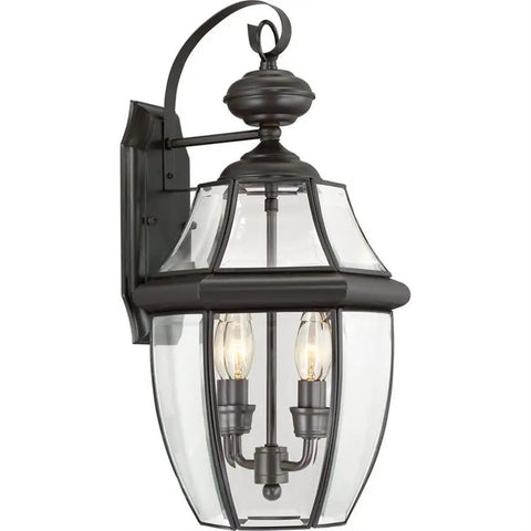 Two Light Outdoor Wall Lantern In Antique Brass Finish For Patio And Entry, Classic Newbury Style Mount Light, close-up view.