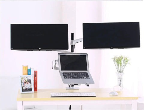 Slick Full Motion Desk Mount For 17-32 Inch Monitors And 10-15.6 Inch Laptops with dual monitors and laptop setup on a desk.