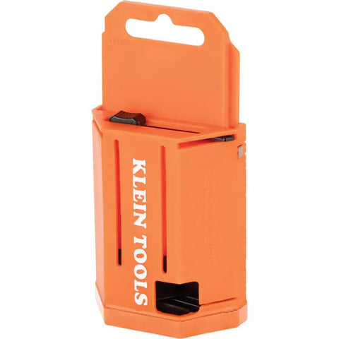 Orange utility knife blade dispenser with 50 triple ground blades for pros and DIYers, shown from a side angle.