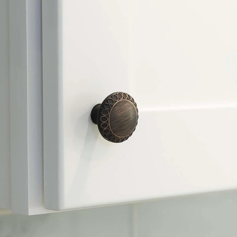 Ravenna Series Solid Traditional Kitchen Cabinet Pull Handle Knob One And One Quarter Inch Oil Rubbed Bronze on white cabinet