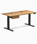 Top Tier Adjustable Standing Desk With A Badass Teak Hardwood Top And Seamless Under Desk Drawer Matte Black Frame 60 Inch Wide showing side view with dual motors.