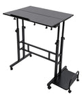 Smooth Operator Height Adjustable Standing Desk With Heavy Duty Steel Build And Six Easy Roll Wheels For Ergonomic Sit Stand Office Setup To Level Up Your Grind, black finish and adjustable height.