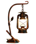 Rustic Lantern Table Lamp With Glass Shade For Living Room And Bedroom Cozy Nightstand Lighting For End Tables Farmhouse Style Bedside Lamp That Delivers Warm Homey Vibe, metal base, hanging lantern design.