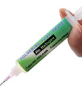 Hand holding 10cc syringe of No Clean Flux Paste For Electronics, Lead Free Rosin Soldering Flux, Halogen Free