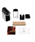 Pixie EN127S One Button Capsule Espresso Machine With a Legit 19 Bar Pump Quick Heat System Multi Function Brew Welcome Pack Included Ultra Compact Silver Coffee Maker For Home Office And Small Kitchens with accessories and manuals.