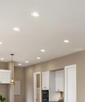 LED 75 Watt Equivalent BR30 Indoor Recessed Flood Light Bulbs illuminating modern kitchen ceiling.