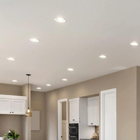 LED 75 Watt Equivalent BR30 Indoor Recessed Flood Light Bulbs illuminating modern kitchen ceiling.