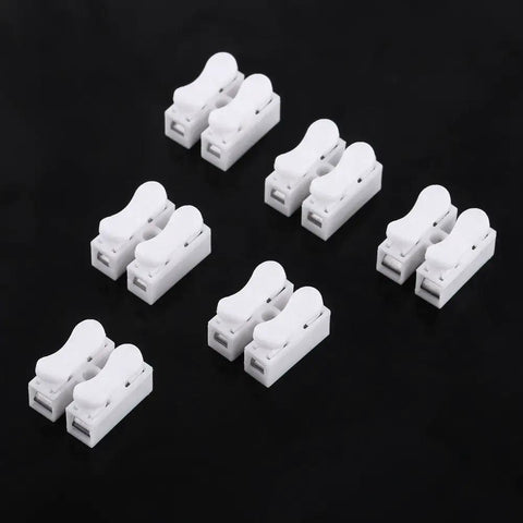 100 Pack 2 Pin Quick Wire Connectors With Spring Clamp Terminals arranged on a black surface