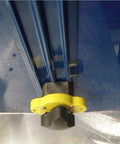Magswitch MagJig 95 magnetic base clamp, yellow knob, mounted on blue metal surface.