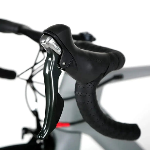 Tiagra gear shifter on Toray T800 Carbon Frame Road Bike Model H with Tiagra 20 Speed Drivetrain, ultra lightweight 18.7 lb build