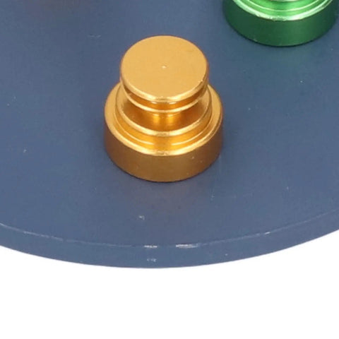 Close-up of Magnetic Welding Bracket Set with gold and green magnetic brackets on metal fixed plate