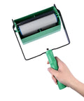 Slick Patterned Paint Roller With Swappable Texture Wheels And Dual Color Coating Wand For Fast Walls And Ceilings Plus Comfort Grip five inch roller in hand.