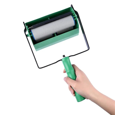 Slick Patterned Paint Roller With Swappable Texture Wheels And Dual Color Coating Wand For Fast Walls And Ceilings Plus Comfort Grip five inch roller in hand.