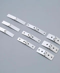 Badass Heavy Duty Folding Hinges 270 Degree Swing For Cabinet Doors And Electrical Boxes Gritty Cast Iron Build 6 Piece Pack two hole mounting system on grey background.