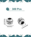 Antique Silver Tube Spacer Beads 300 Pcs Tibetan Zinc Alloy 4x5mm With 2.2mm Hole, detailed close-up view for jewelry making.