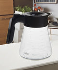 MultiServe 10 Cup Replacement Carafe For Coffee Makers Black With A Narrow Moisture Trapping Design in kitchen setting