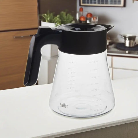 MultiServe 10 Cup Replacement Carafe For Coffee Makers Black With A Narrow Moisture Trapping Design in kitchen setting