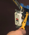 Nonconductive Electrical Wire Pliers For 12 To 14 Gauge, Safe Wire Pulling And Connector Removal Tool in use at an outlet box