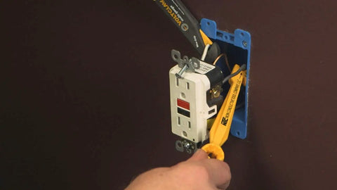 Nonconductive Electrical Wire Pliers For 12 To 14 Gauge, Safe Wire Pulling And Connector Removal Tool in use at an outlet box