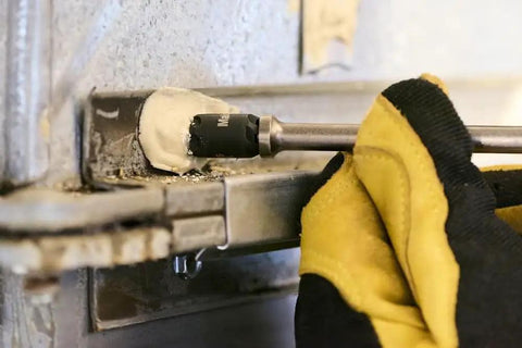 Reversible Hex Driver With 1/4 And 5/16 In Sockets, Sawtooth Sealant Cutter For Go To Fastener Removal in action on metal
