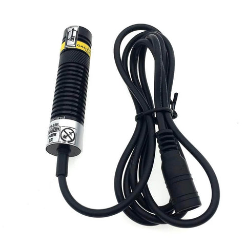 Front view of crosshair alignment module with red cross line light, black ribbed housing and attached cable