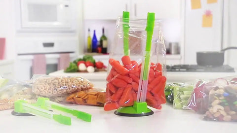 Upgrade Your Kitchen Grind With This Adjustable Ziplock Bag Holder Stand Featuring A Nonslip Base For Effortless Freezer Storage Hands Free Countertop Mount Keeps Plastic Bags Locked Down Straight Up In A Clean Green Set Of Four