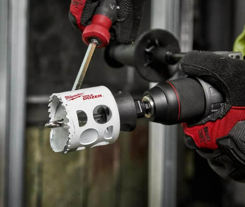 Milwaukee 2-1/2-inch ice-hardened hole saw mounted on a drill (side view)