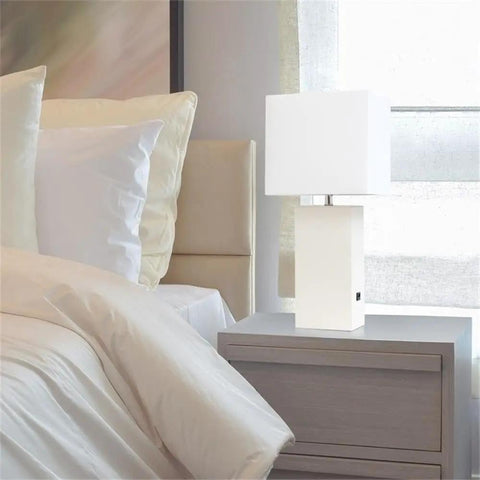 Leather Wrapped Base Table Lamp With USB Port And White Fabric Shade on bedside table in bedroom, 21 Inch Tall