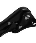 Close-up of black metal Foot Operated Door Stopper For Bottom Of Door No Drill Easy Install Invisible Kickdown Design