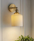 Wall Lamp, Nordic Minimalist Bedroom Light, Brass Ceramic Retro Lamps, wall-mounted with ribbed white shade, suitable for cozy settings.