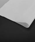 PTFE Film Sheet For Heat Press Transfers, 11.8 x 39.37 inches, 0.1mm thick, white roll on dark background