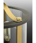 Detail of Three Light Outdoor Large Wall Lantern From Squire Collection With Clear Glass And Matte Black Finish Traditional Exterior