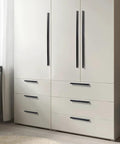 Black Tilted Aluminum Cabinet Handles 12 Pack 5 Inch 128mm Hole Centers Finger Pulls installed on white cabinet drawers.