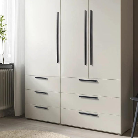Black Tilted Aluminum Cabinet Handles 12 Pack 5 Inch 128mm Hole Centers Finger Pulls installed on white cabinet drawers.
