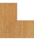 Close-up of a 90-degree corner joint on wood using Carbide Tipped 45 Degree Lock Miter Router Bit With 3-1/8 Inch Large Diameter.