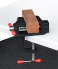 Mini Tabletop Vise Clamp On For Jewelry Making And Watch Repair, Portable Aluminum Alloy Bench Vise With Walnut Finish, Ideal For Carving, DIY Crafts, Sculpture, Clip On Tool, Black on white table edge
