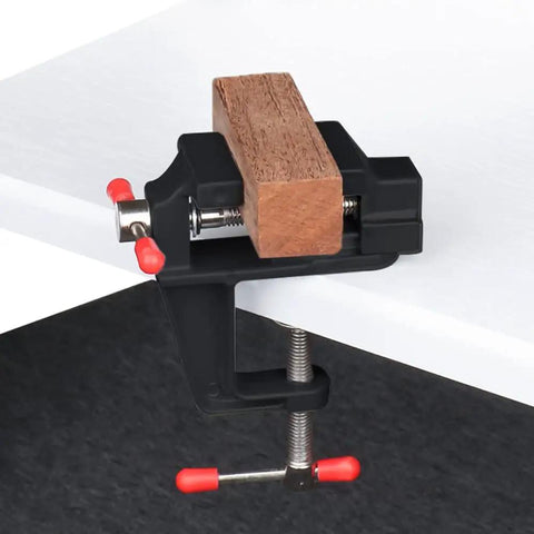 Mini Tabletop Vise Clamp On For Jewelry Making And Watch Repair, Portable Aluminum Alloy Bench Vise With Walnut Finish, Ideal For Carving, DIY Crafts, Sculpture, Clip On Tool, Black on white table edge