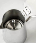 Open top view of a Stainless Steel Stovetop Espresso Maker for 6 cups, showing heat-resistant, non-reactive design for rich bold brew