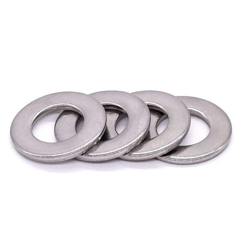 Front view: stainless steel flat washers, 1/4 in ID, 0.63 in OD, bright finish, four shown