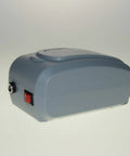 Side view of Palm Sized Lab Dual Function Vacuum And Pressure Pump For Filtration And Distillation, ultra compact and versatile.