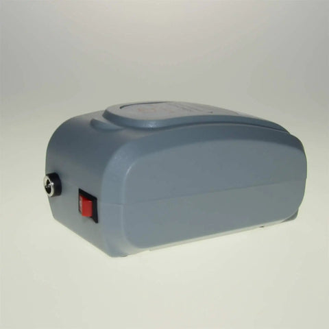 Side view of Palm Sized Lab Dual Function Vacuum And Pressure Pump For Filtration And Distillation, ultra compact and versatile.